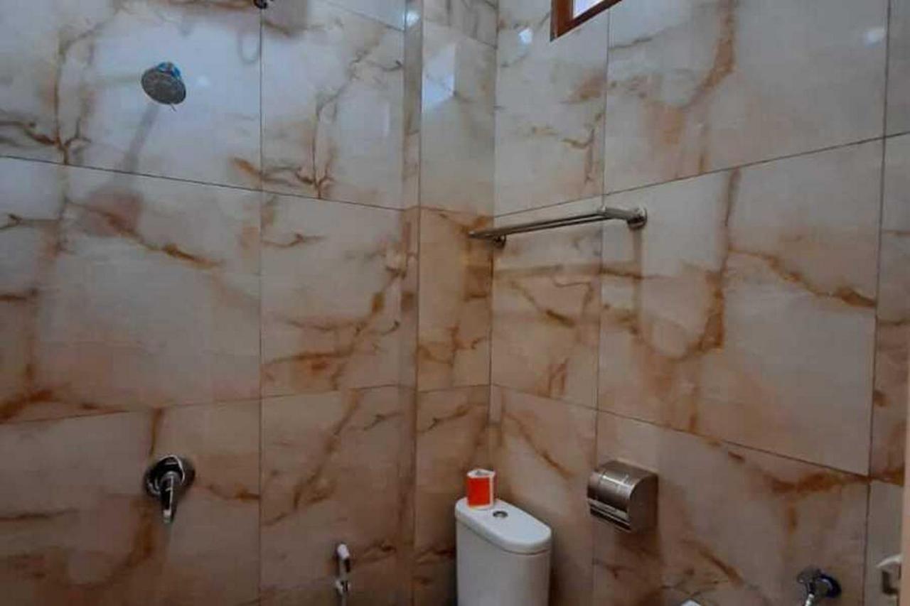 RedDoorz near Universitas Muhammadiyah Purwokerto Kembaran Bagian luar foto